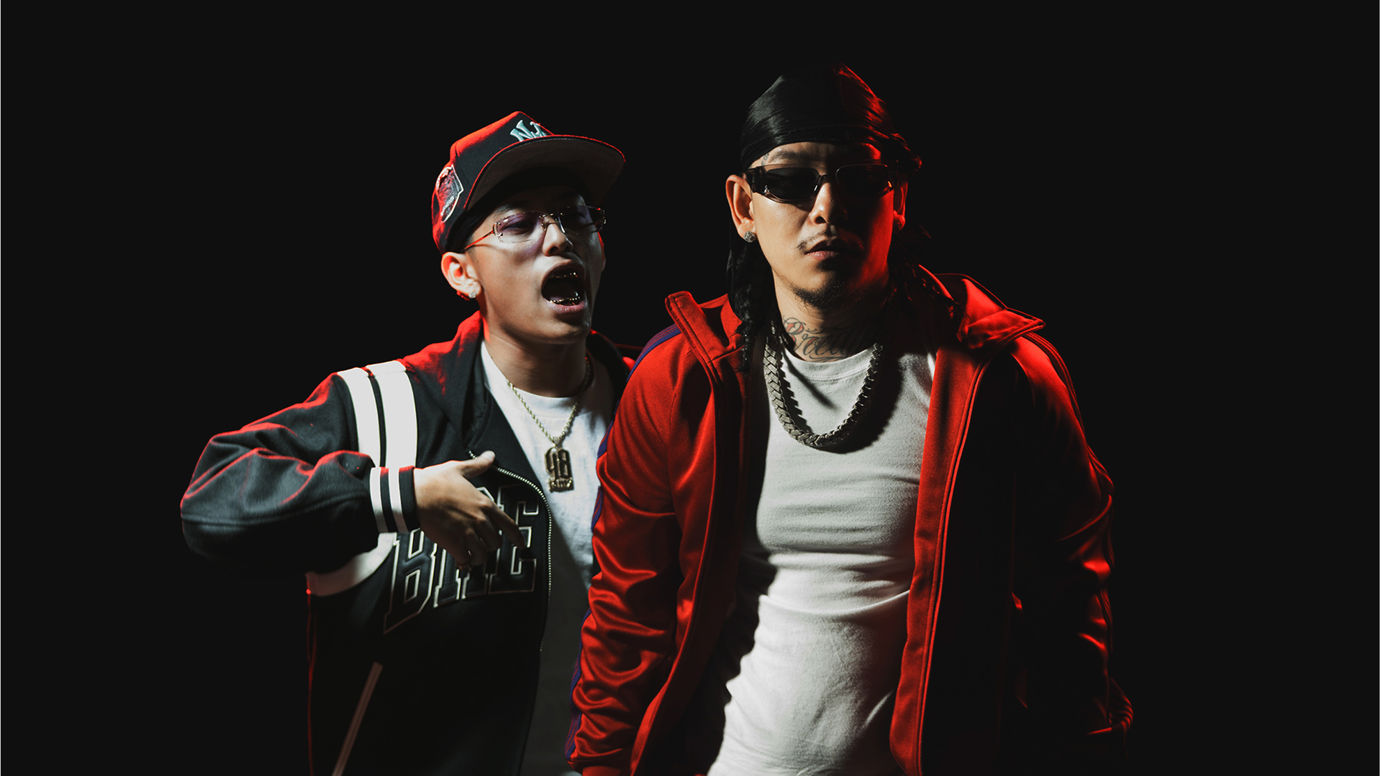 Graphic of a typography specimen showing the alphabet and numerals on top of a dark gray background.