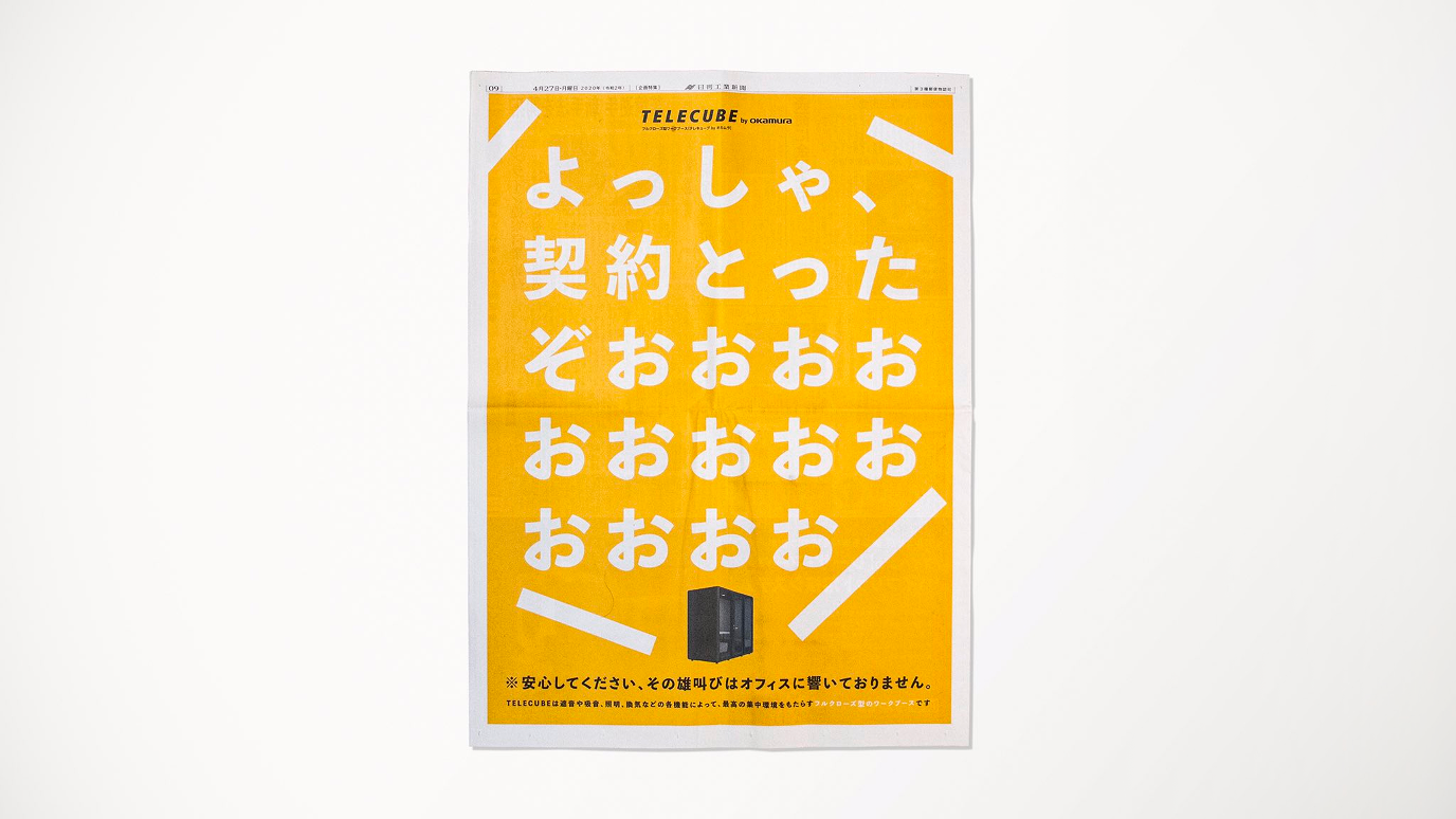 Graphic of a typography specimen showing the alphabet and numerals on top of a dark gray background.