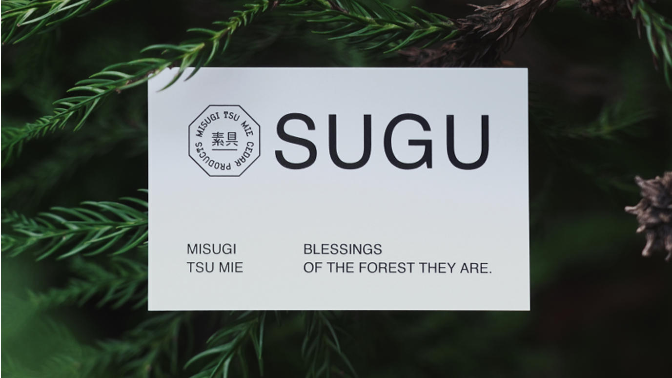 Graphic of a typography specimen showing the alphabet and numerals on top of a dark gray background.